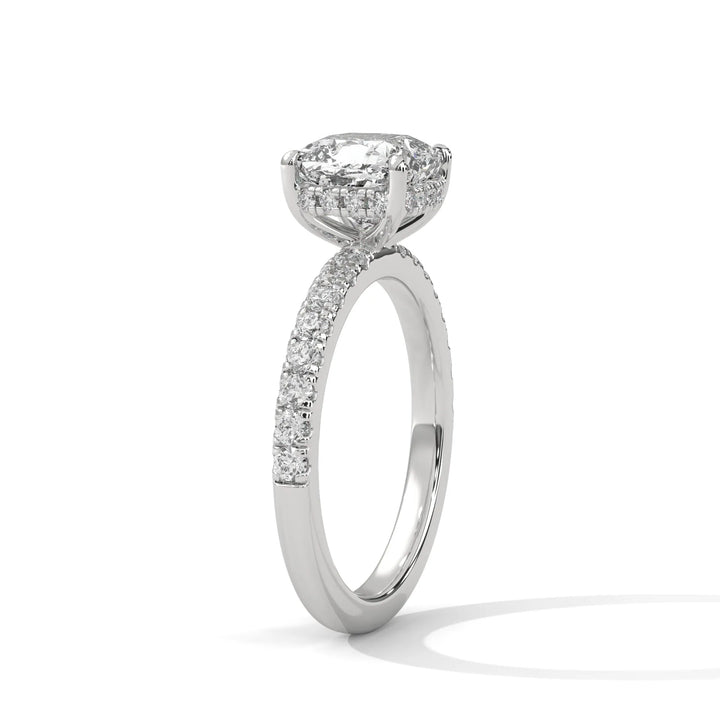 A beautiful white gold engagement ring with an cushion 14k white gold diamond centerpiece, crafted in a Sun Belt setting.