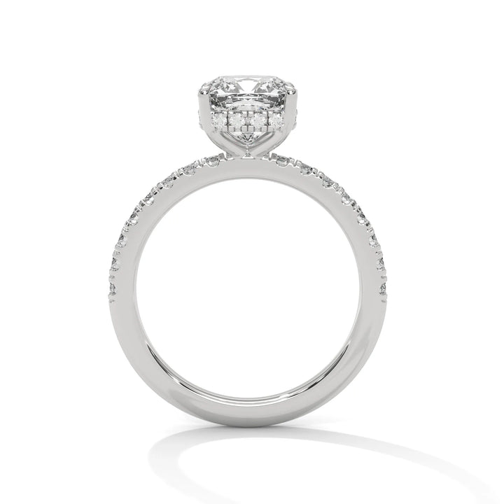 A white gold engagement ring featuring a stunning cushion diamond center in a Sun Belt setting.