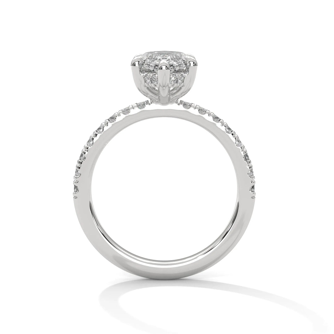 A white gold engagement ring featuring a stunning marquise diamond center in a Sun Belt setting.