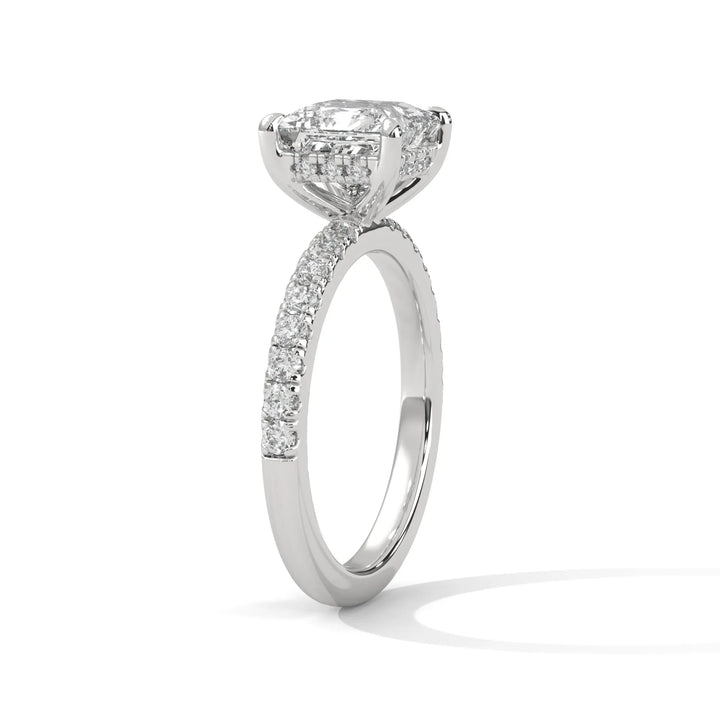 A beautiful white gold engagement ring with an princess 14k white gold diamond centerpiece, crafted in a Sun Belt setting.