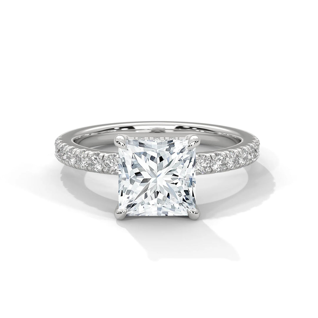 An exquisite princess 14k diamond engagement ring in white gold, highlighted by a sophisticated Sun Belt setting for a timeless look.