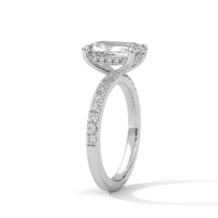 A beautiful white gold engagement ring with an radiant 14k white gold diamond centerpiece, crafted in a Sun Belt setting.