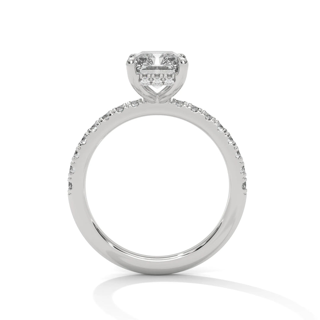 A white gold engagement ring featuring a stunning radiant diamond center in a Sun Belt setting.