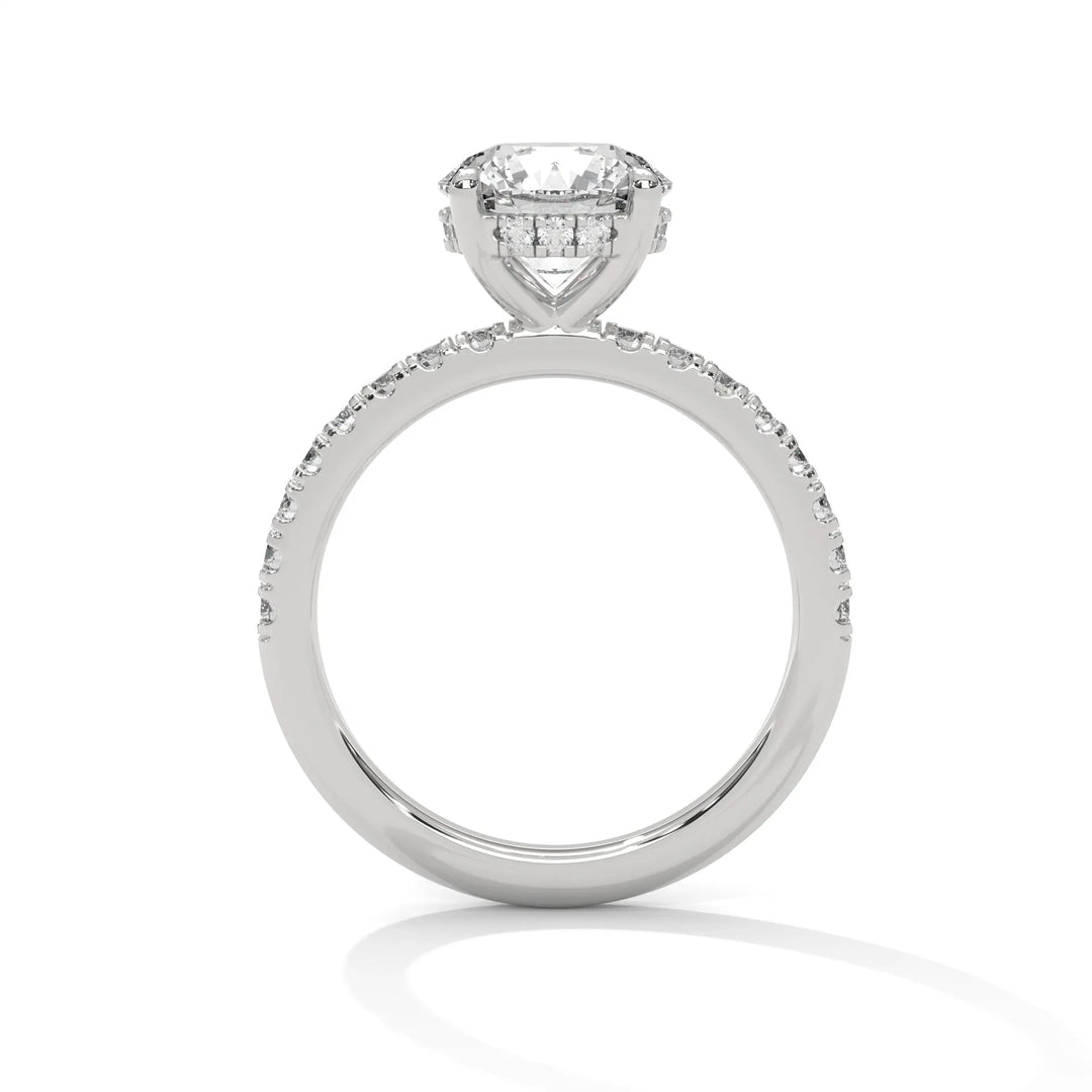 A white gold engagement ring featuring a stunning round diamond center in a Sun Belt setting.