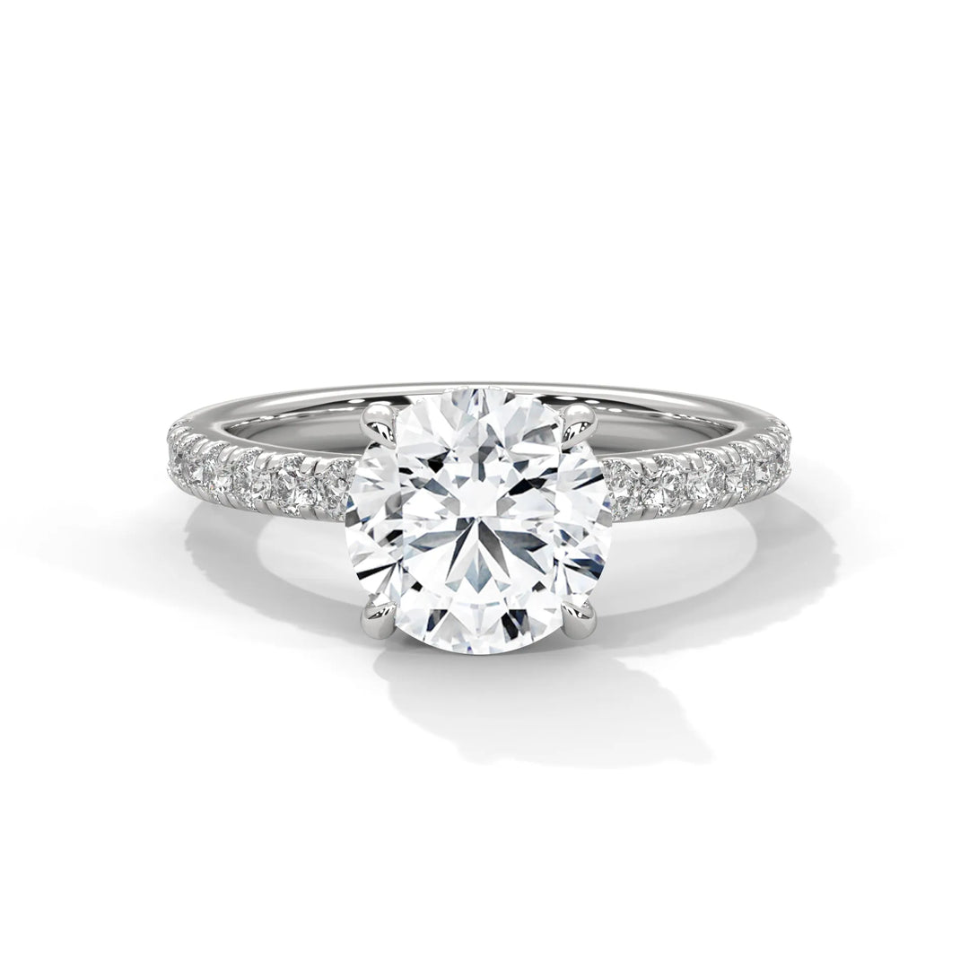 An exquisite round 14k diamond engagement ring in white gold, highlighted by a sophisticated Sun Belt setting for a timeless look.