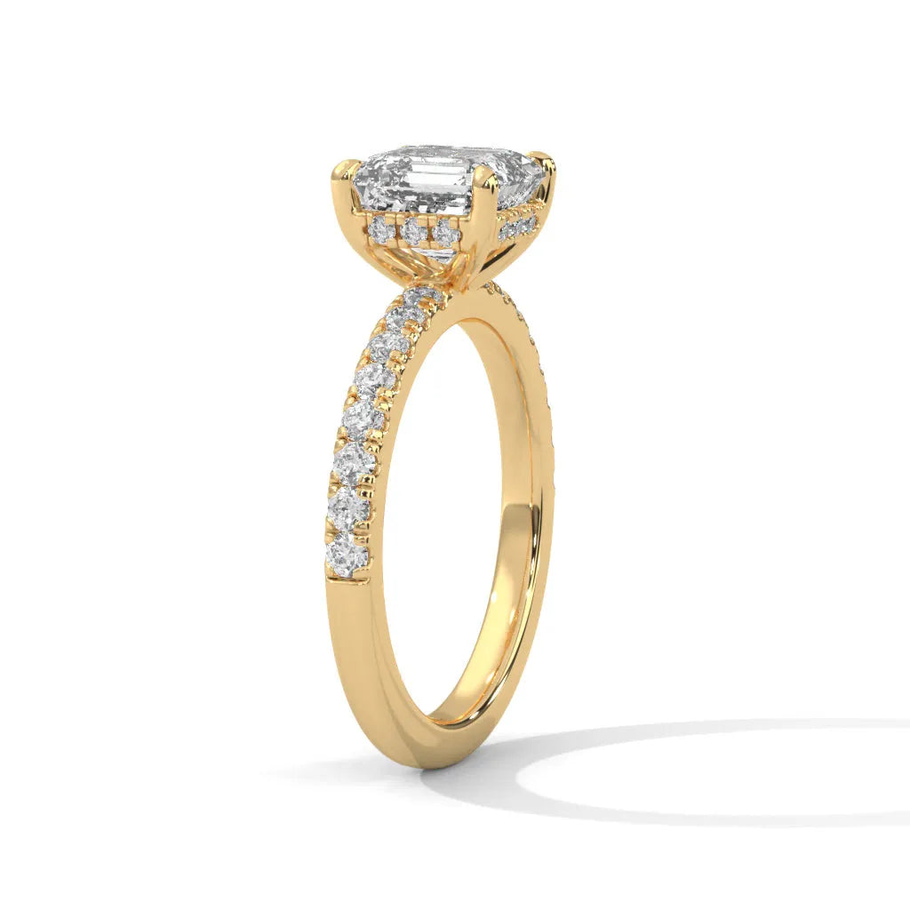 A beautiful yellow gold engagement ring with an asscher 14k yellow gold diamond centerpiece, crafted in a Sun Belt setting.