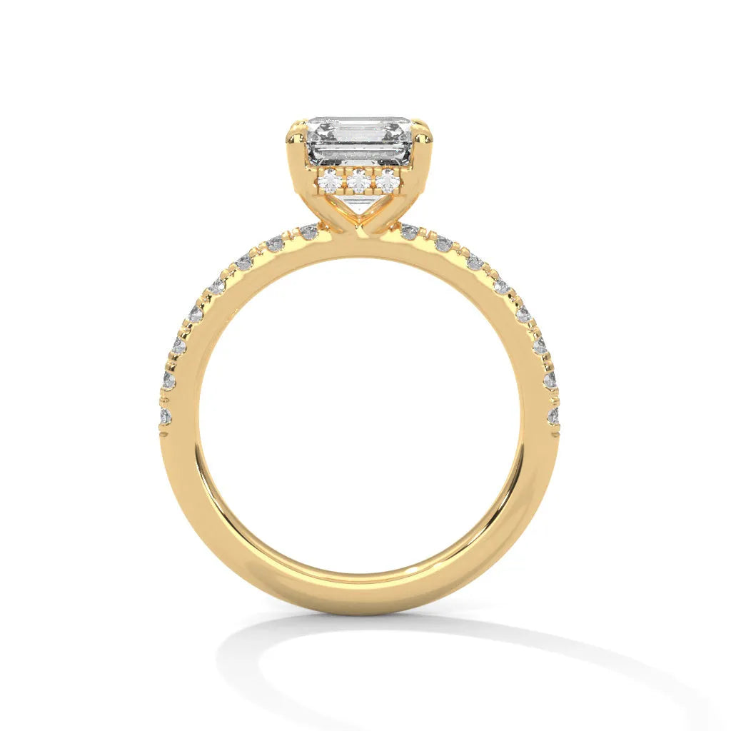 A yellow gold engagement ring featuring a stunning asscher diamond center in a Sun Belt setting.