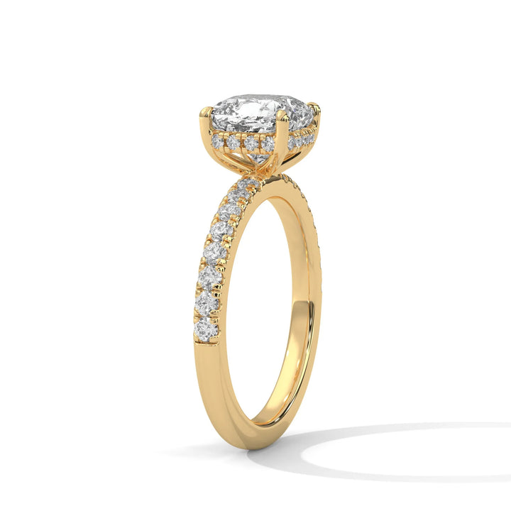 A beautiful yellow gold engagement ring with an cushion 14k yellow gold diamond centerpiece, crafted in a Sun Belt setting.