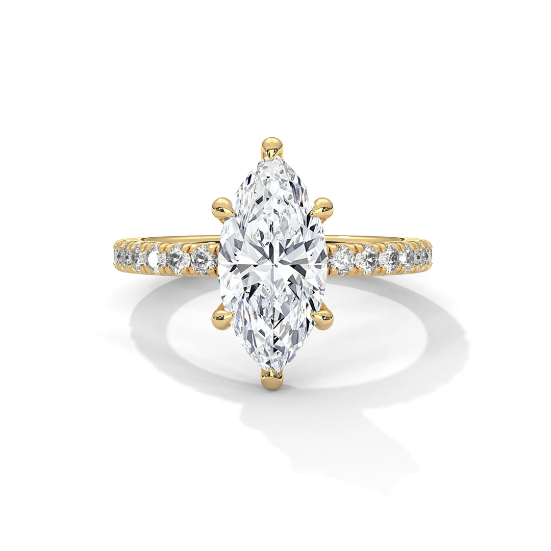 An exquisite marquise 14k diamond engagement ring in yellow gold, highlighted by a sophisticated Sun Belt setting for a timeless look.