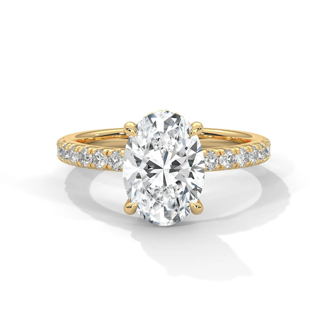 An exquisite oval 14k diamond engagement ring in yellow gold, highlighted by a sophisticated Sun Belt setting for a timeless look.