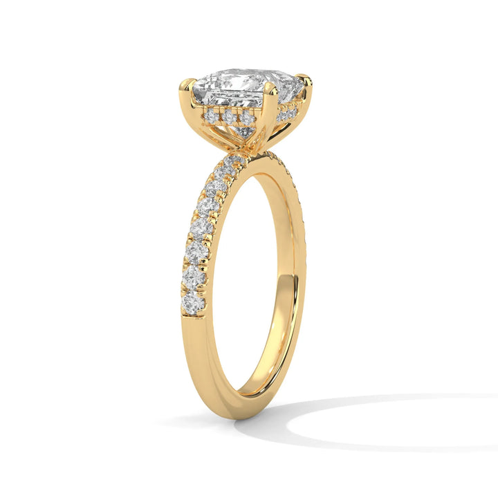 A beautiful yellow gold engagement ring with an princess 14k yellow gold diamond centerpiece, crafted in a Sun Belt setting.