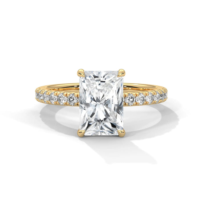 An exquisite radiant 14k diamond engagement ring in yellow gold, highlighted by a sophisticated Sun Belt setting for a timeless look.