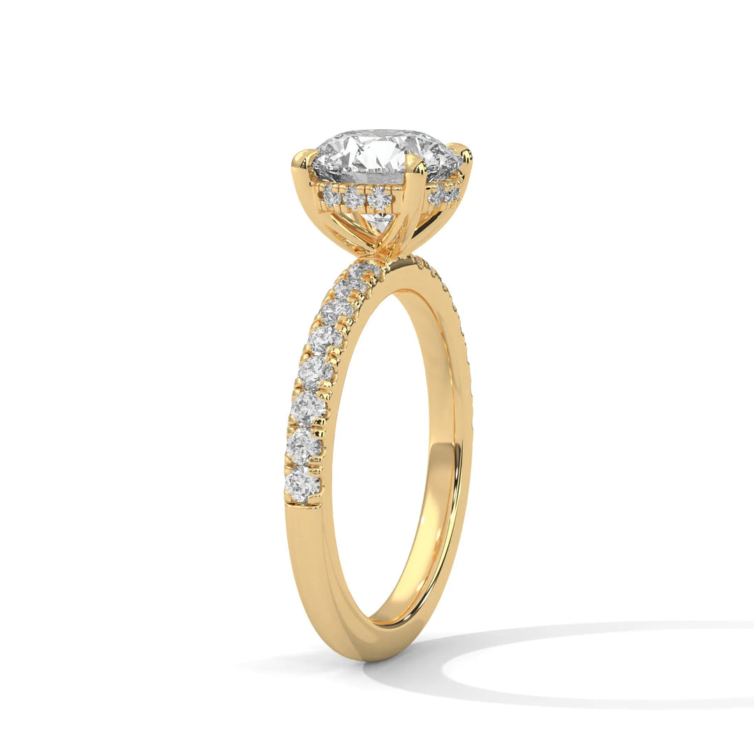 A beautiful yellow gold engagement ring with an round 14k yellow gold diamond centerpiece, crafted in a Sun Belt setting.