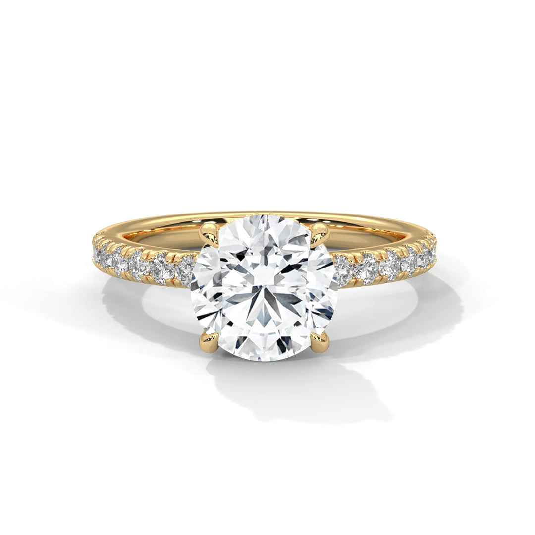 An exquisite round 14k diamond engagement ring in yellow gold, highlighted by a sophisticated Sun Belt setting for a timeless look.