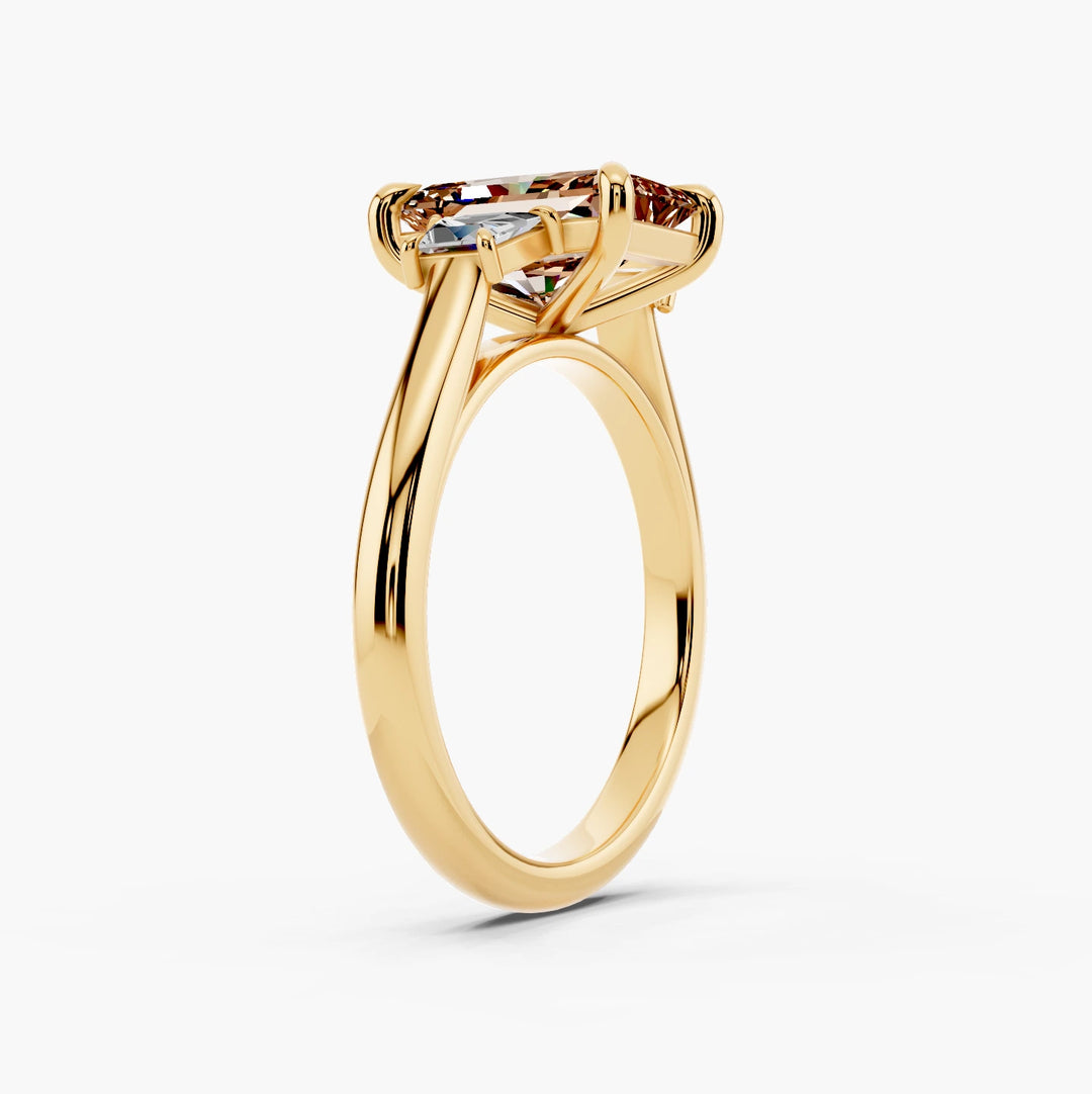 Three Stone Step Cut Trapezoid Champagne Setting Radiant cut engagement ring in 14k Yellow Gold persp